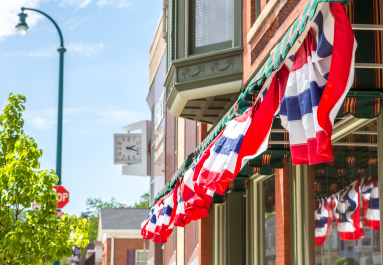 Patriotic bunting on a business in a small town, shallow depth