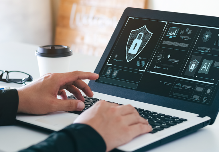 hands typing on laptop computer. computer screen showing concept of cyber security, information security and encryption, secure access to user\'s personal information, secure Internet access, cybersecurity.