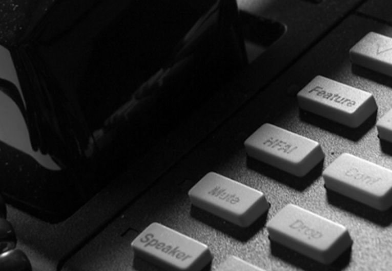 Close up of black phone for phone systems for small business