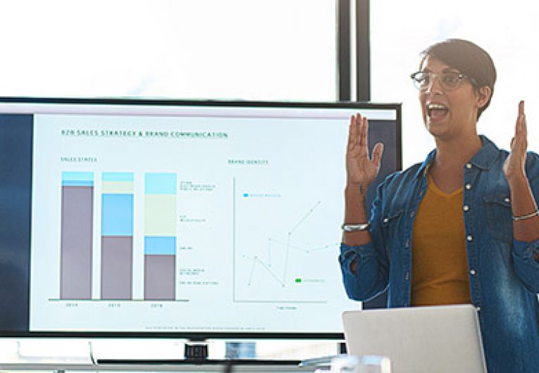 woman giving presentation to a group